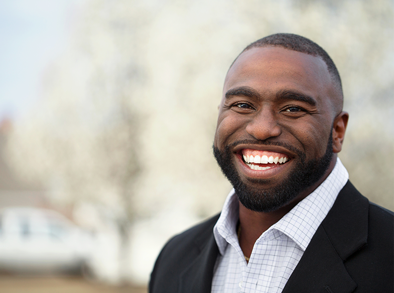 Image of smiling man.